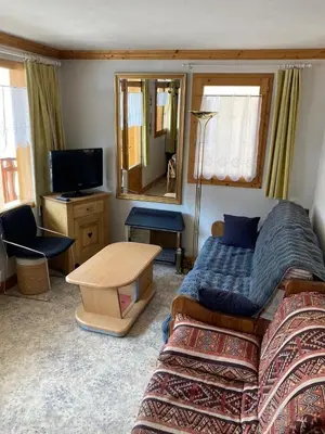 Coin salon dans l'établissement Appartement 2 étoiles en pied de pistes et au centre ville 4 personnes