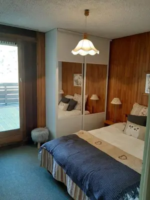 Un ou plusieurs lits dans un hébergement de l'établissement Family mountain apartment