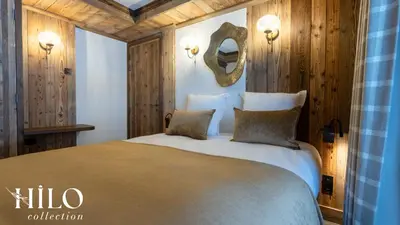 Un ou plusieurs lits dans un hébergement de l'établissement Suite Gelinotte 401 Val d'Isère by HILO Collection - 12 people - Jacuzzi