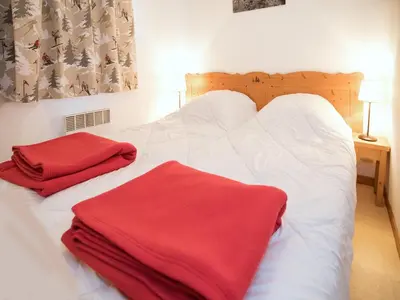 Un ou plusieurs lits dans un hébergement de l'établissement Family apartment with balcony