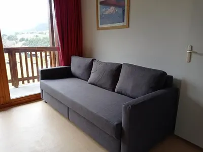 Coin salon dans l'établissement Apartment for 6 people near River