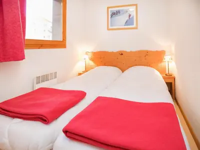 Un ou plusieurs lits dans un hébergement de l'établissement Apartment with balcony for 6 people