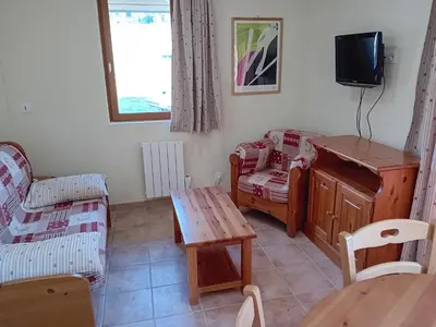 Télévision ou salle de divertissement dans l'établissement Apartment near Télésiège Girarde