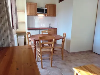 Cuisine ou kitchenette dans l'établissement Apartment near Télésiège Girarde