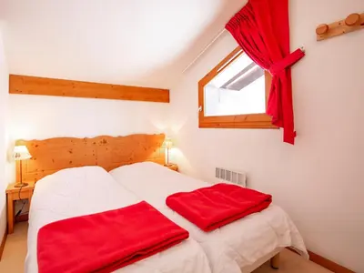 Un ou plusieurs lits dans un hébergement de l'établissement Apartment in Val Cenis near River