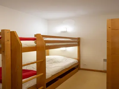 Un ou plusieurs lits dans un hébergement de l'établissement Apartment in Val Cenis near River