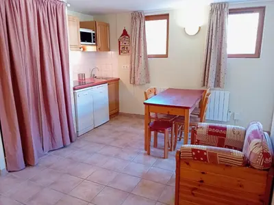 Cuisine ou kitchenette dans l'établissement Apartment with parking near River