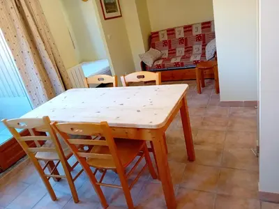 Coin salon dans l'établissement Apartment for 6 people with 2 rooms