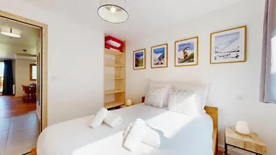 Un ou plusieurs lits dans un hébergement de l'établissement Nouveau ! Au coeur des Montagnes
