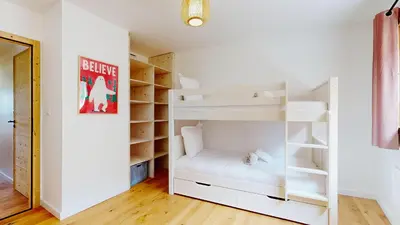 Un ou plusieurs lits dans un hébergement de l'établissement Nouveau ! Au coeur des Montagnes