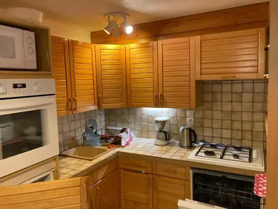 Cuisine ou kitchenette dans l'établissement Chalet LA MOURRA