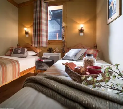 Un ou plusieurs lits dans un hébergement de l'établissement lesetoilesdelaplagne chalet 16 au pied piste a belle plagne