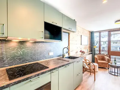Cuisine ou kitchenette dans l'établissement Apartment Le Hameau de Tovière-5 by Interhome