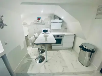 Cuisine ou kitchenette dans l'établissement Ici, dort un Yeti
