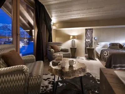 Coin salon dans l'établissement Le Taos