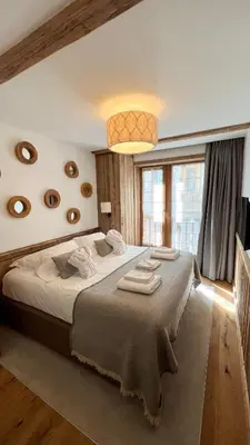 Un ou plusieurs lits dans un hébergement de l'établissement Résidence KILIMANDJARO - appt 3 pièces 60m2 - by Hotel MontBlanc