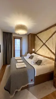 Un ou plusieurs lits dans un hébergement de l'établissement Résidence KILIMANDJARO - appt 3 pièces 60m2 - by Hotel MontBlanc