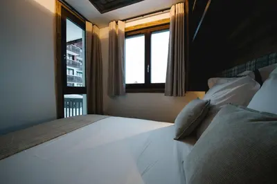 Un ou plusieurs lits dans un hébergement de l'établissement Appartement Eclipse by ExplorHome I 4 à 6 personnes I Skis aux pieds I Tignes, Val Claret