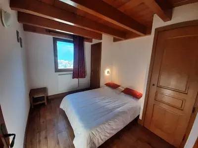 Un ou plusieurs lits dans un hébergement de l'établissement Appartement spacieux 6 pers, vue montagne, WIFI - FR-1-508B-7