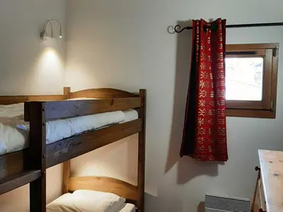 Un ou plusieurs lits dans un hébergement de l'établissement Appartement spacieux 6 pers, vue montagne, WIFI - FR-1-508B-7