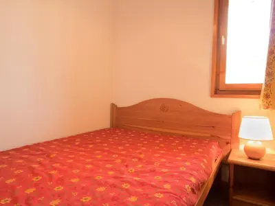 Un ou plusieurs lits dans un hébergement de l'établissement Appartement calme à Aussois, proche navettes et activités - FR-1-508B-10