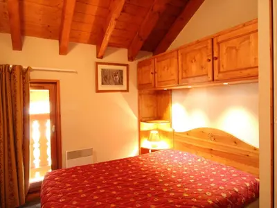 Un ou plusieurs lits dans un hébergement de l'établissement Appartement confortable pour 6 pers avec balcon à Aussois - FR-1-508B-3