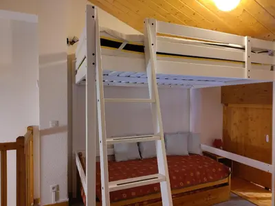 Un ou plusieurs lits superposés dans un hébergement de l'établissement Appartement Duplex 8 Pers, Calme, Près Navettes et Piscine - FR-1-508B-17