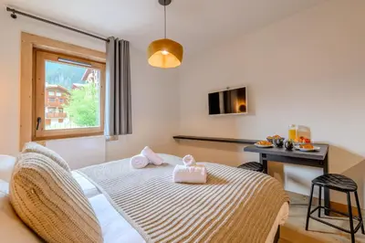 Un ou plusieurs lits dans un hébergement de l'établissement TERRESENS - L'Etoile de la Vanoise