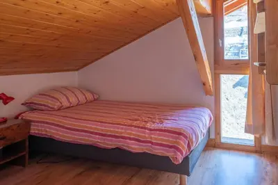 Un ou plusieurs lits dans un hébergement de l'établissement Le Placement - 6-kamer chalet | 10/11 personen ***