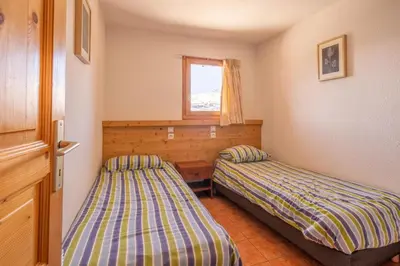 Un ou plusieurs lits dans un hébergement de l'établissement Le Placement - 6-kamer chalet | 10/11 personen ***