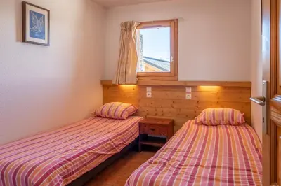 Un ou plusieurs lits dans un hébergement de l'établissement Le Placement - 6-kamer chalet | 10/11 personen ***