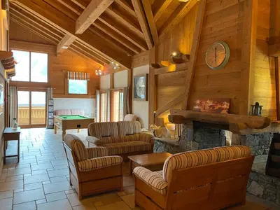 Coin salon dans l'établissement Champagny Les Alpages