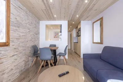 Coin salon dans l'établissement Résidence Le Val d'Illaz - Val-d'Isère