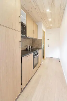 Cuisine ou kitchenette dans l'établissement Résidence Le Val d'Illaz - Val-d'Isère