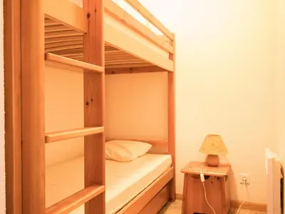 Un ou plusieurs lits dans un hébergement de l'établissement Appartement confortable pour 5/6 pers, wifi gratuit - FR-1-508B-21