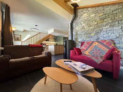 Coin salon dans l'établissement SAINT FE 701C Charmant appartement 6per Sainte Foy Tarentaise