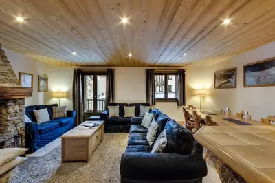 Coin salon dans l'établissement Chalet La Mourra