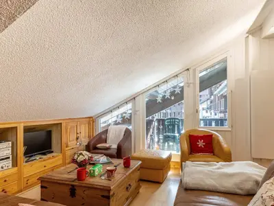 Coin salon dans l'établissement Duplex 3 pièces avec wifi et parking, 6 pers., au pied des pistes à Val-d'Isère - FR-1-694-422
