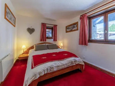 Un ou plusieurs lits dans un hébergement de l'établissement Duplex 3 pièces avec wifi et parking, 6 pers., au pied des pistes à Val-d'Isère - FR-1-694-422