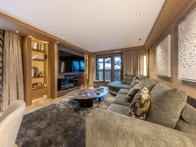 Coin salon dans l'établissement Appartement de luxe 4 pièces 111m² avec terrasse à Val-d'Isère - FR-1-694-425
