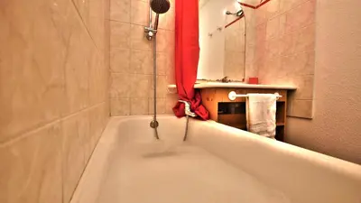 Salle de bains dans l'établissement Le Refuge de Lu'