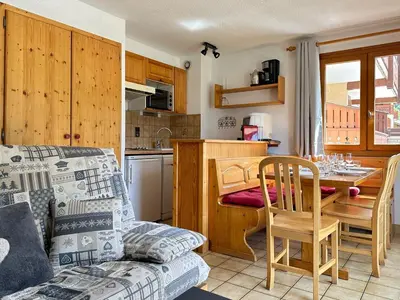 Cuisine ou kitchenette dans l'établissement Le Levasset vue montagne proche pistes