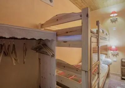 Un ou plusieurs lits superposés dans un hébergement de l'établissement Chalet le Névé