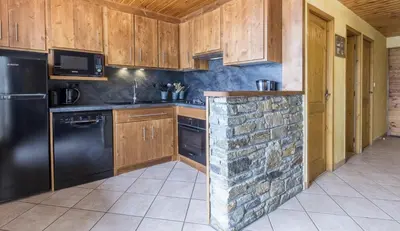 Cuisine ou kitchenette dans l'établissement Chalet le Névé