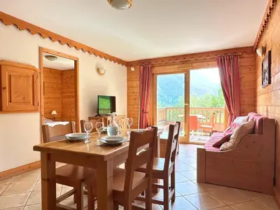 Télévision ou salle de divertissement dans l'établissement L’Arolles - Spa, Calme & Vue Montagne