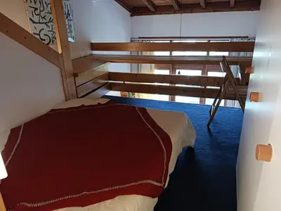 Un ou plusieurs lits dans un hébergement de l'établissement Studio mezzanine pour 5 personnes aux Arcs 1800 avec animaux admis - FR-1-411-964