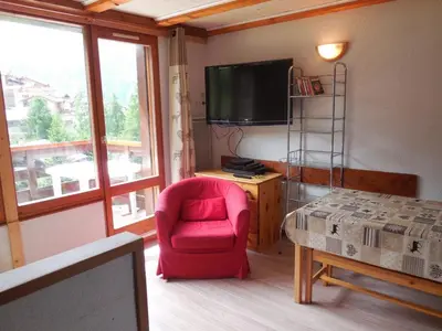 Télévision ou salle de divertissement dans l'établissement Paradiski bordure de pistes vallandry