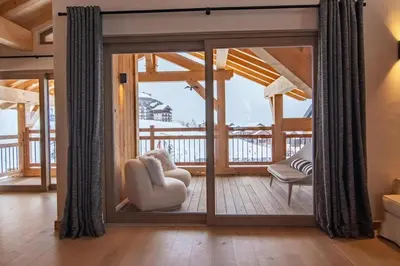 Coin salon dans l'établissement Chalet Le Rokh