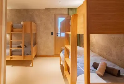 Un ou plusieurs lits dans un hébergement de l'établissement Chalet Le Rokh