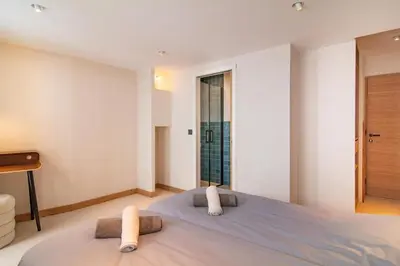 Un ou plusieurs lits dans un hébergement de l'établissement Chalet Le Rokh